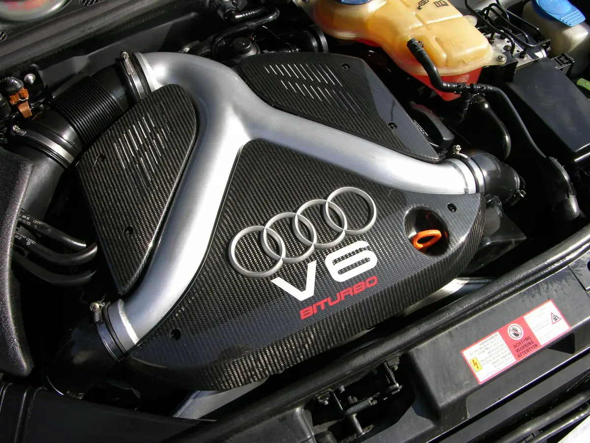 Audi 2.7T V6 biturbo engine with carbon intake tract in a B5 engine bay